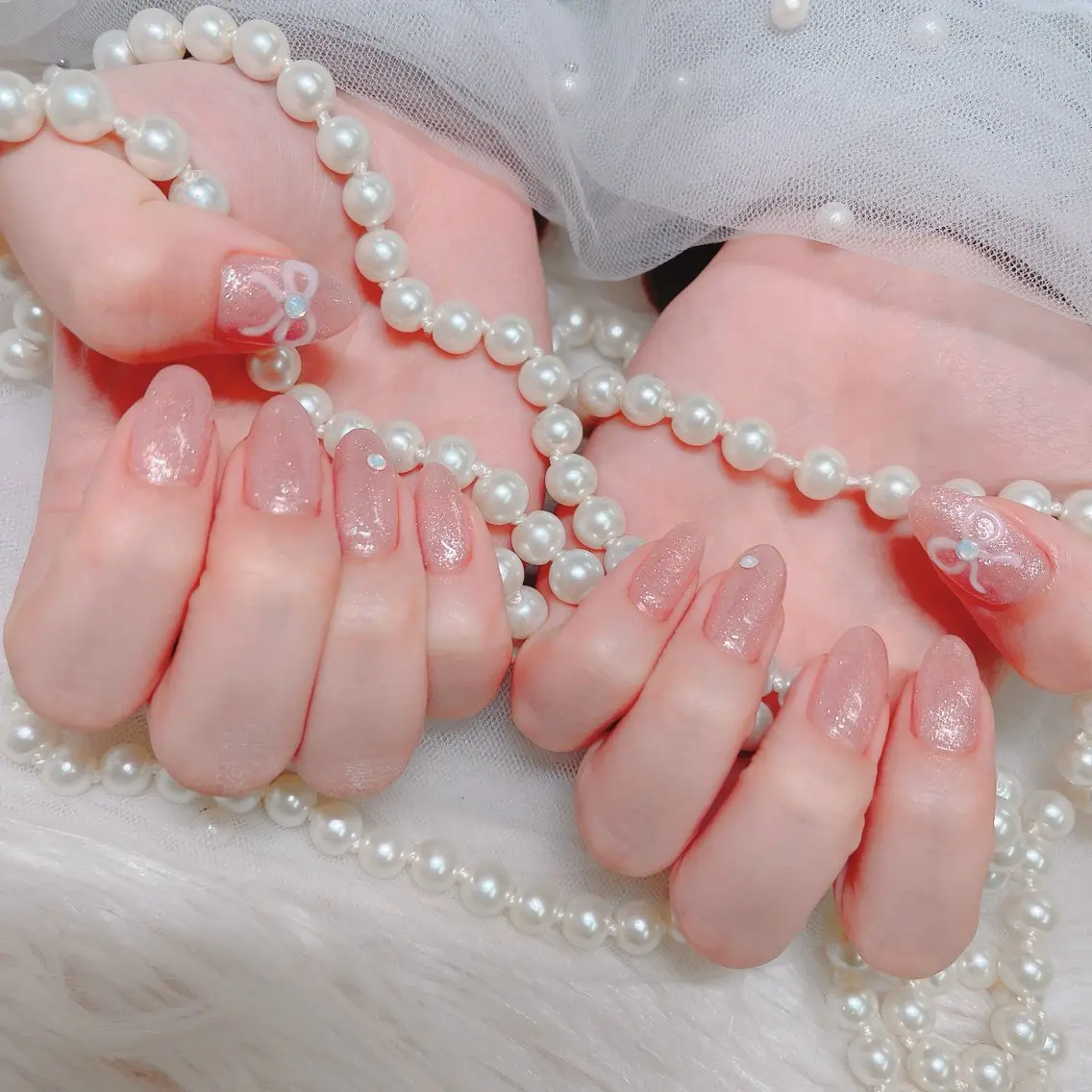 ネイル キラキラネイル リボン 💛KAREN‪ 🪄新宿✨nailのネイルデザイン