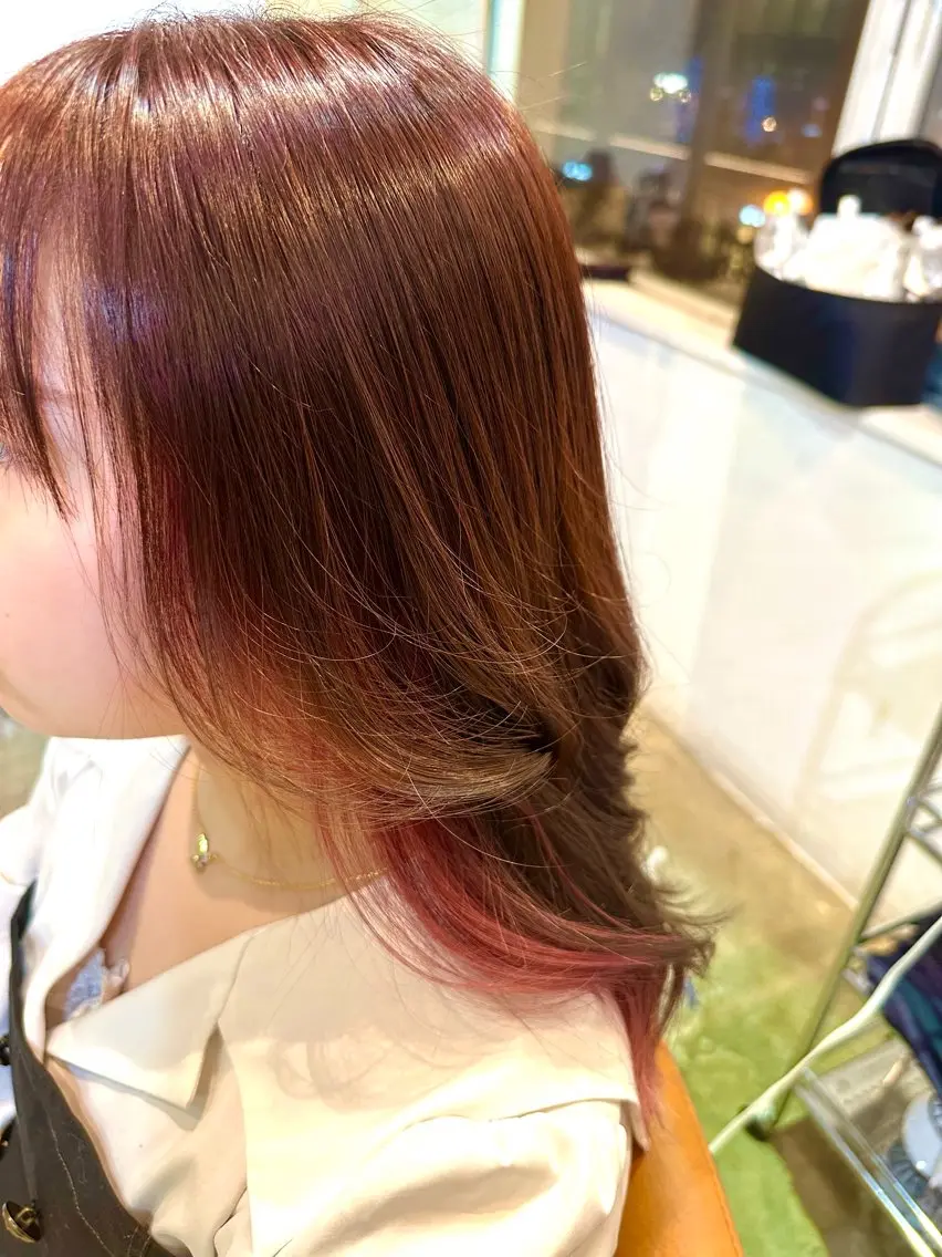金 春江のヘアスタイル