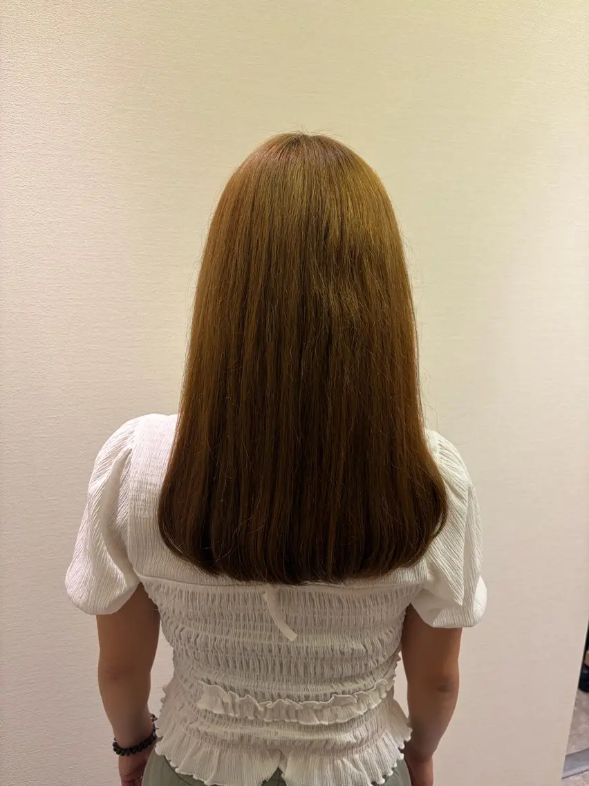ロング MAHAE 岡田のヘアスタイル