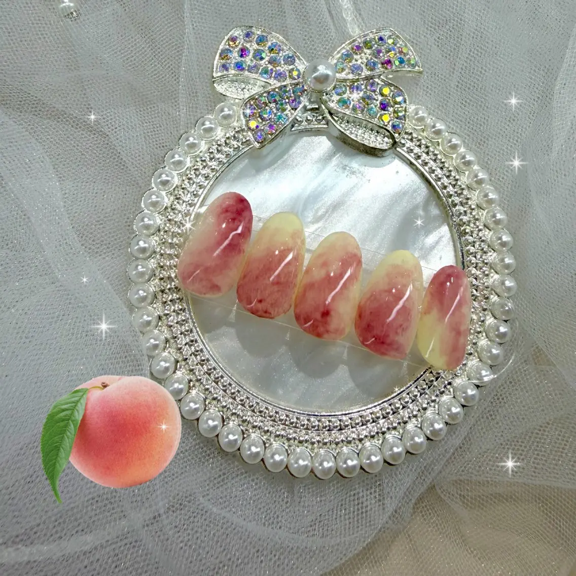 【夏限定】桃ネイル🍑の写真