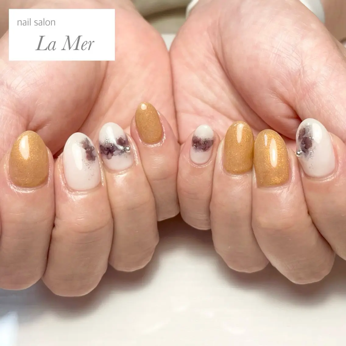 ネイル カジュアル マグネットネイル ニュアンスネイル オレンジ 春ネイル ハンドネイル nailsalon La Merのネイルデザイン