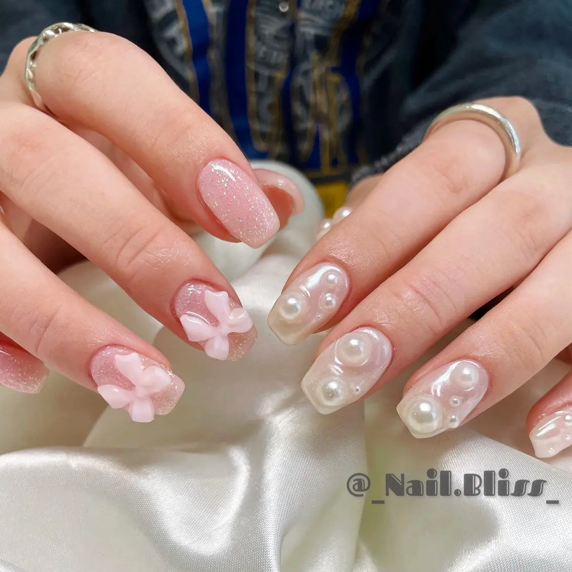 ネイル オーロラネイル ラメ(グリッター) ピンク リボン ハンドネイル NAIL BLISSのネイルデザイン
