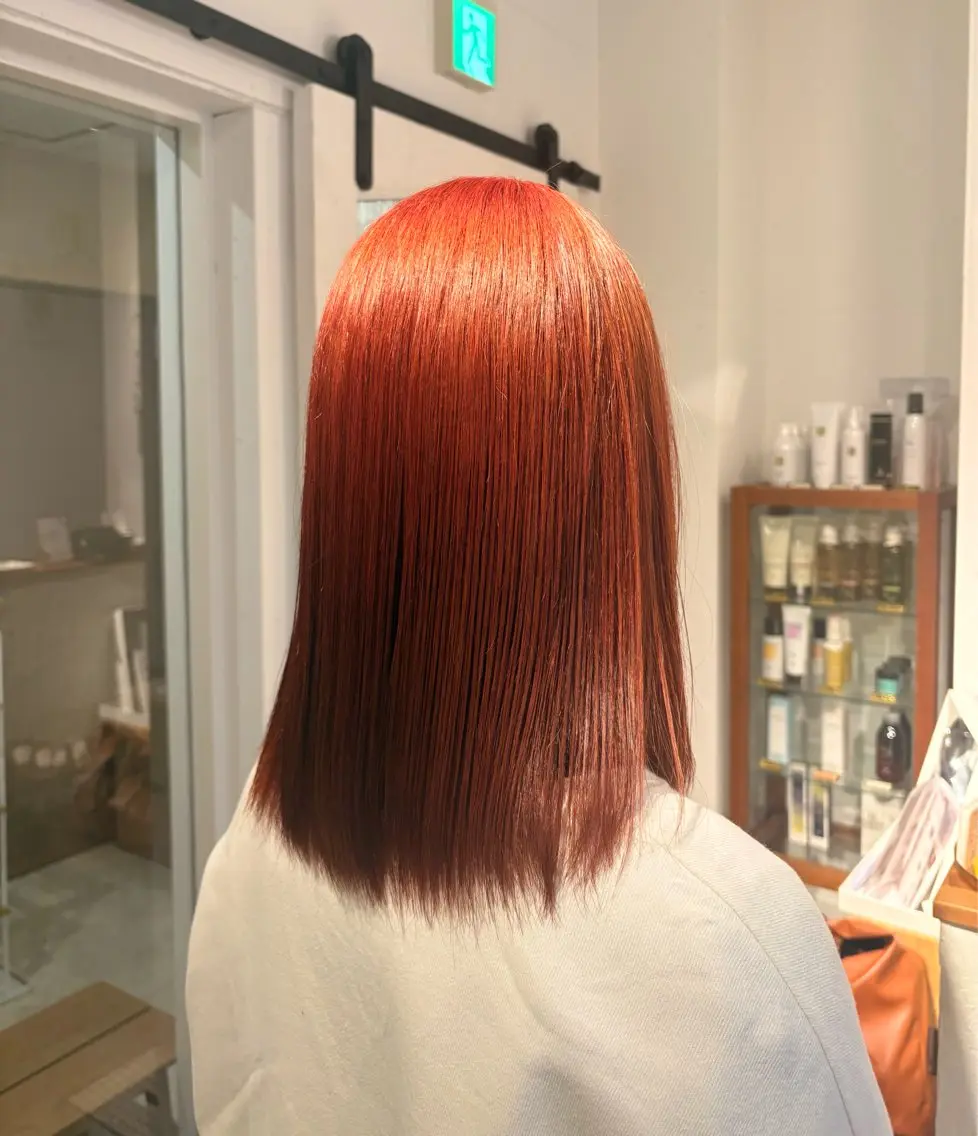 ミディアム カラー ブリーチ ダブルカラー ハイトーンカラー オレンジ オレンジレッド ヘアカラー rina/似合わせ/ 透明感/髪質改善のヘアスタイル