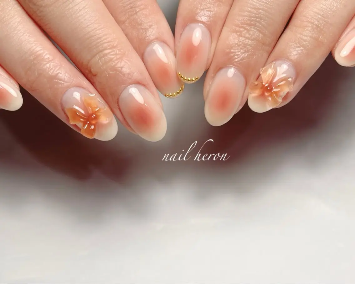 ネイル チークネイル リボン ハンドネイル saki_ nail heronのネイルデザイン