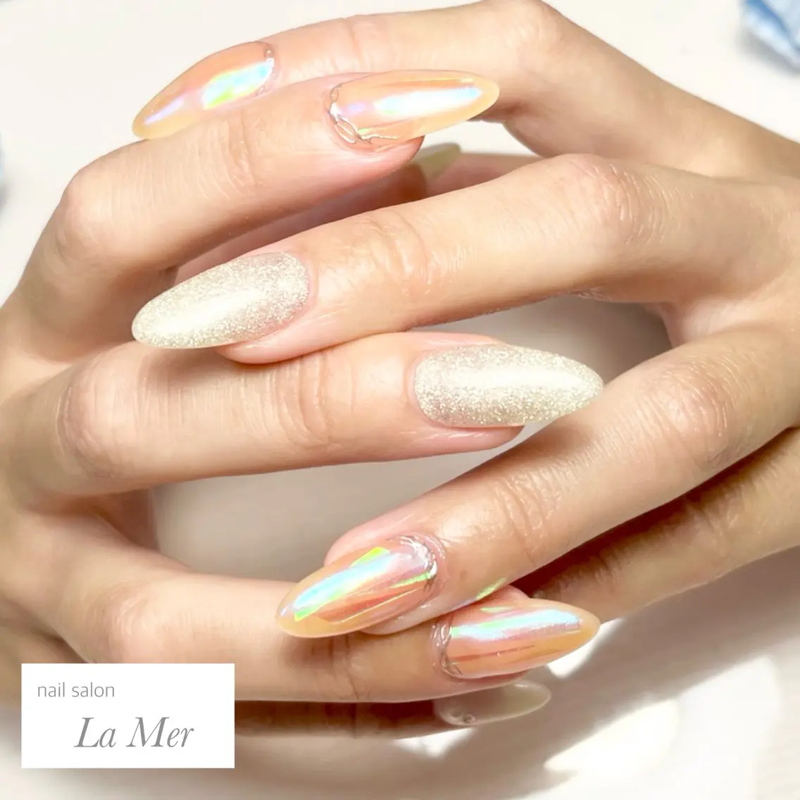 ネイル オーロラネイル ラメ(グリッター) ロングネイル ミラーネイル オレンジ ハンドネイル nailsalon La Merのネイルデザイン