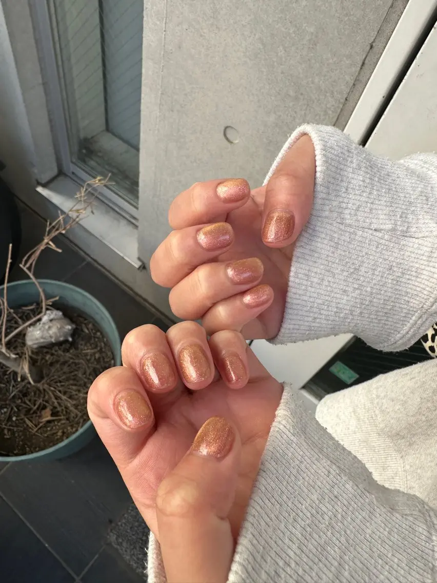 ネイル キラキラネイル オレンジ ルミエナリトリート MUKAEDAのネイルデザイン