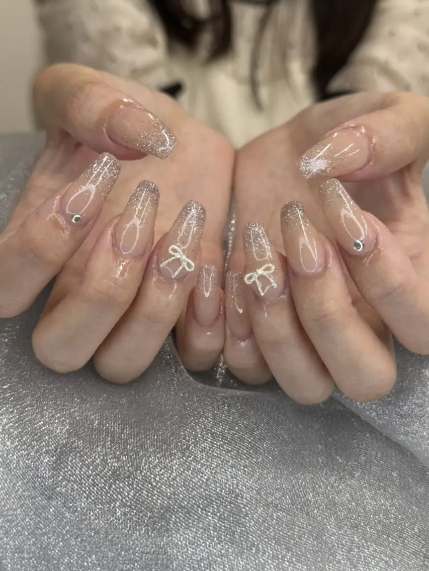 ネイル 氷ネイル・うるうるネイル マットネイル ニュアンスネイル リボン 夏ネイル ハンドネイル rina nailのネイルデザイン