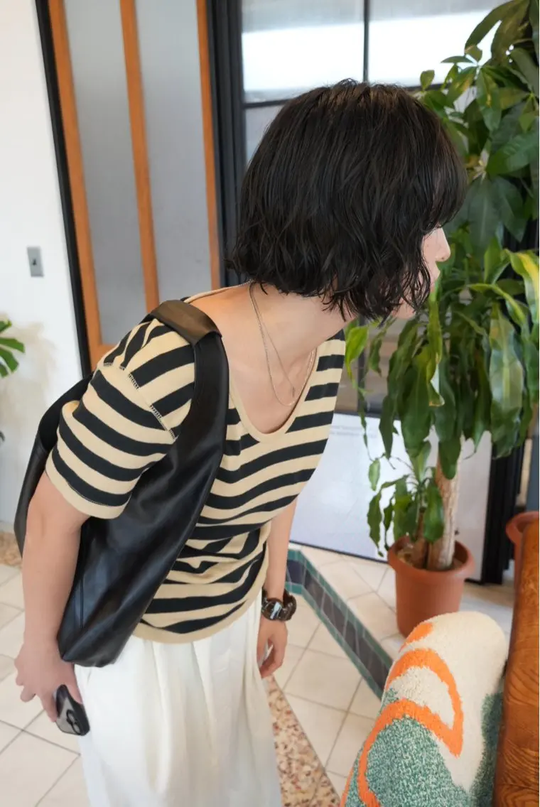 ミディアム パーマ ウチミズ サヤカのヘアスタイル