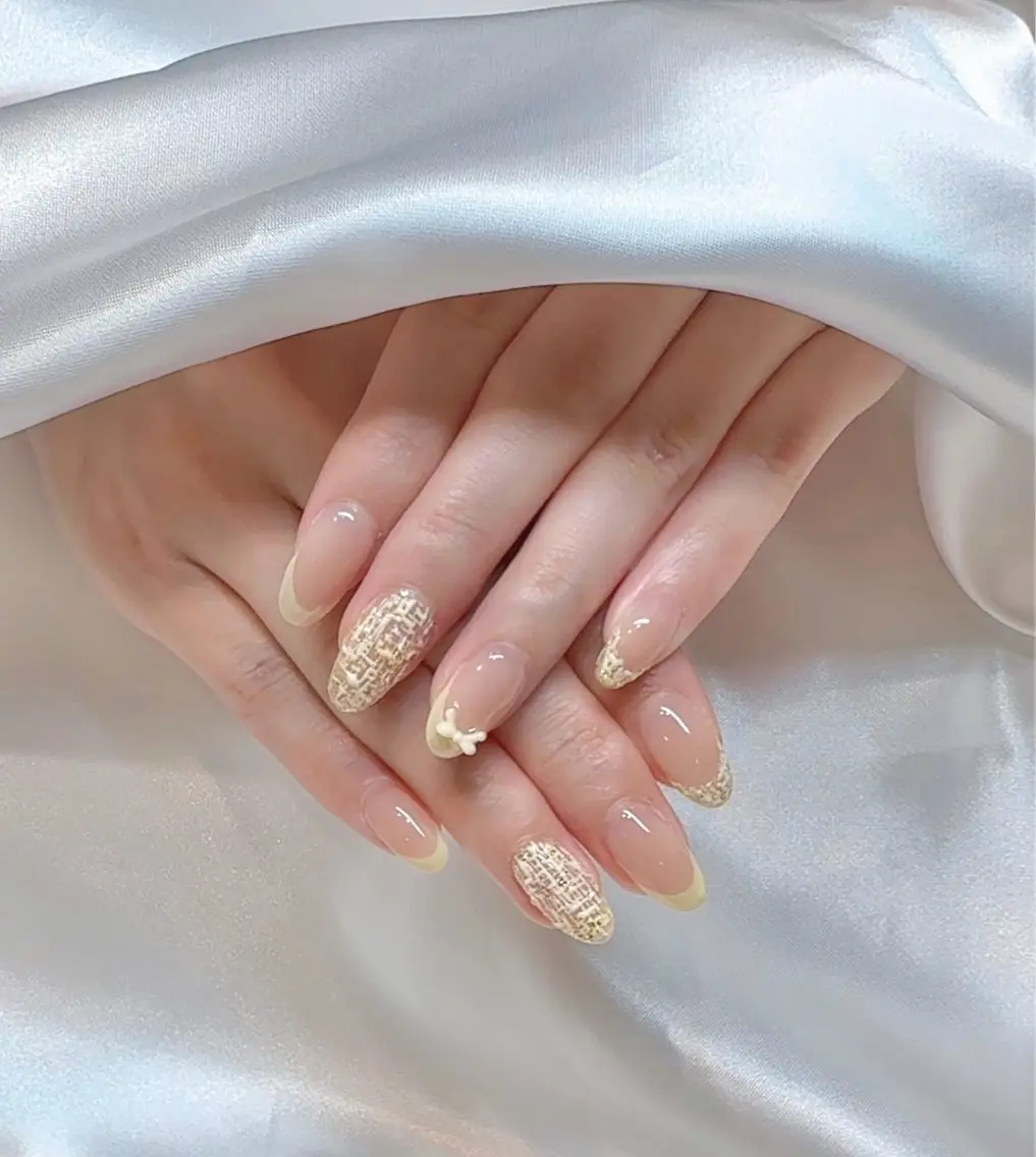 ネイル ツイードネイル 黄色 nail Latteのネイルデザイン