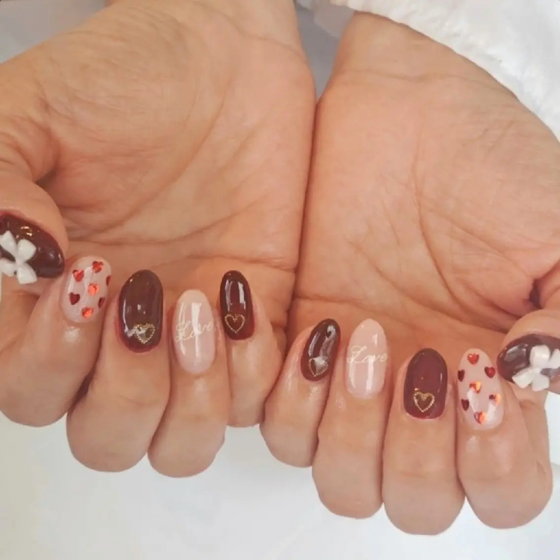 ネイル ハート リボン バレンタイン 冬ネイル ハンドネイル felicita fumi🩷のネイルデザイン