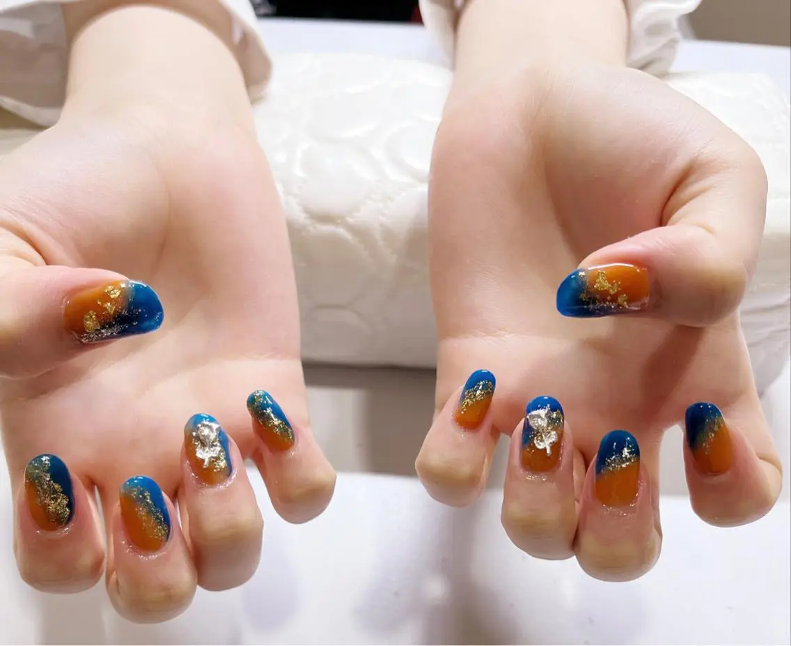 ネイル グラデーション ラメ(グリッター) ニュアンスネイル オレンジ ハンドネイル toystage .nailのネイルデザイン