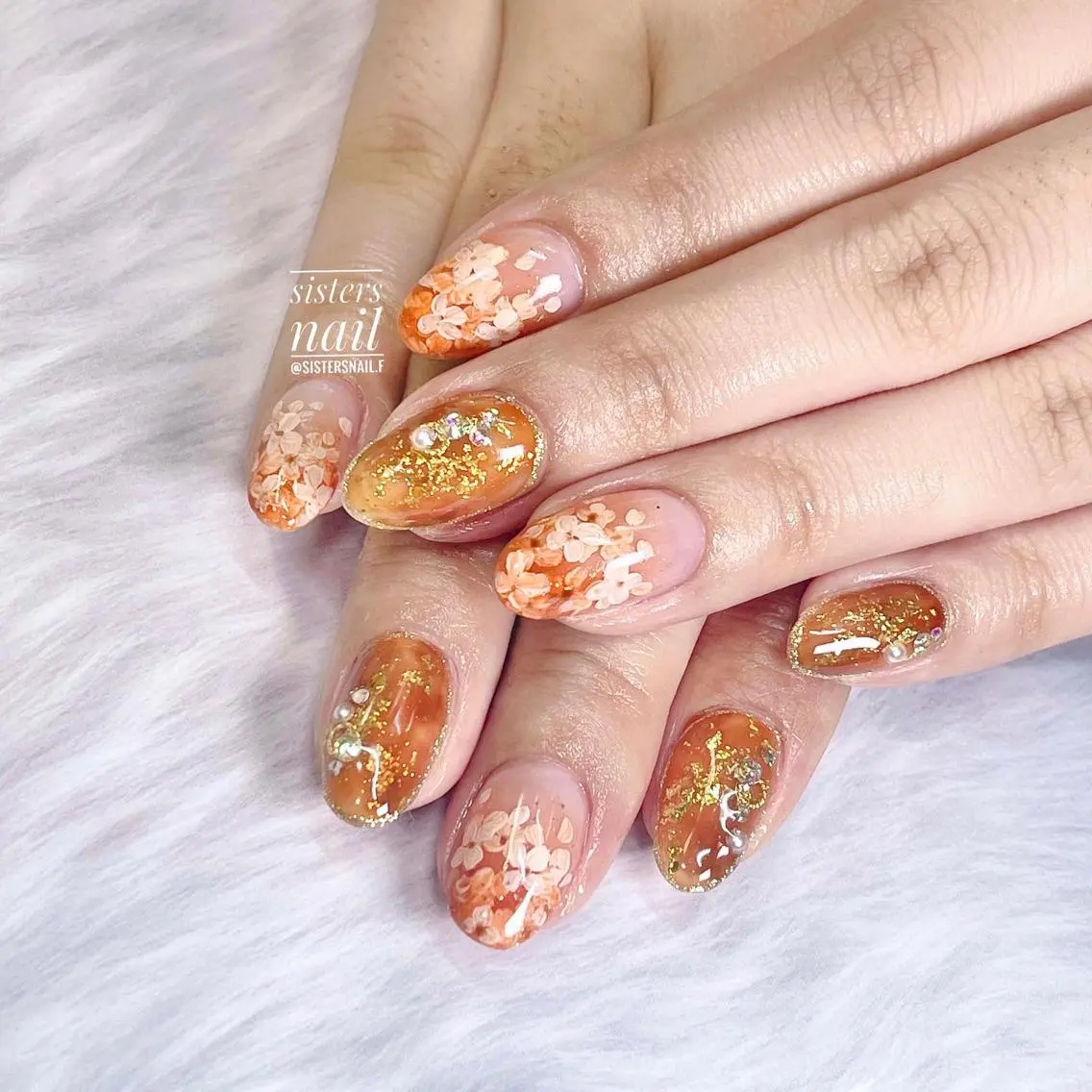 ネイル アートネイル べっ甲ネイル フラワーネイル オレンジ sisters nail.fのネイルデザイン