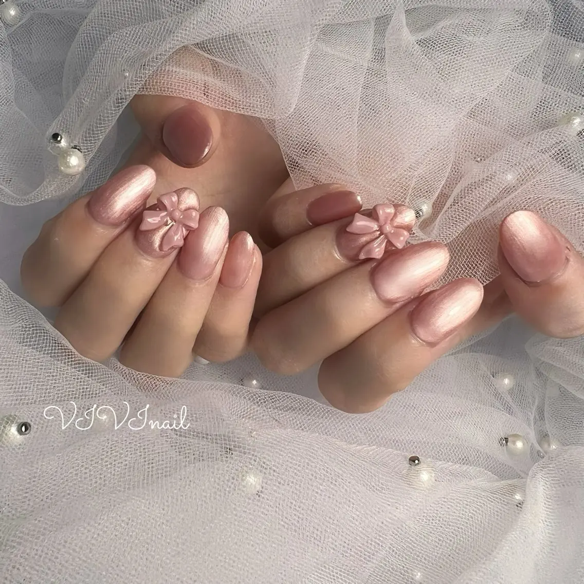 ネイル ワンカラーネイル ピンク リボン ハンドネイル vivi nailのネイルデザイン
