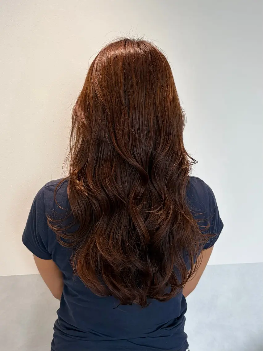 ロング カット パーマ トリートメント ゆうか 栄 コテ巻きパーマのヘアスタイル