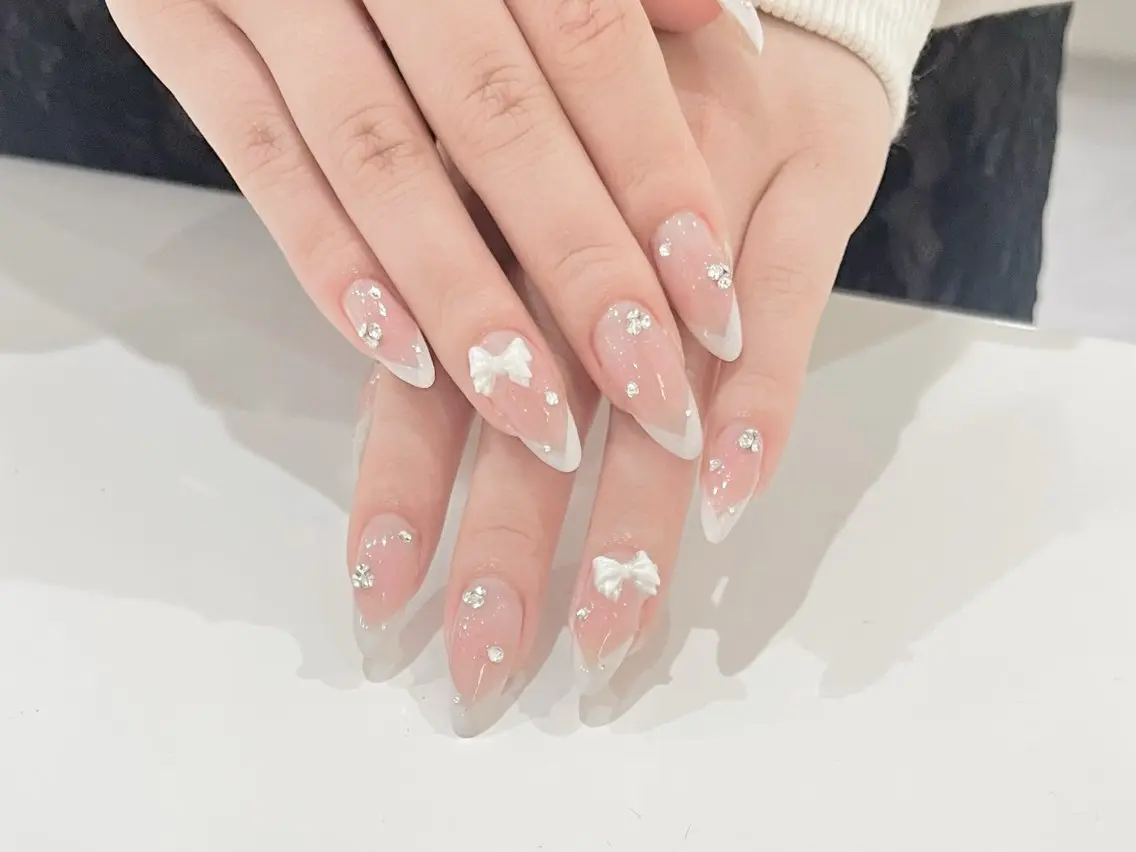 ネイル ピンク リボン ハンドネイル FLY Nail Salonのネイルデザイン