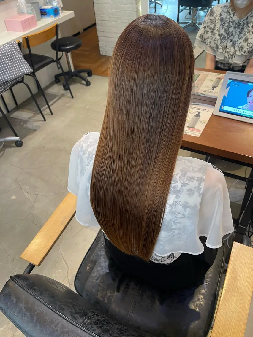 ロング 平栗 篤のヘアスタイル