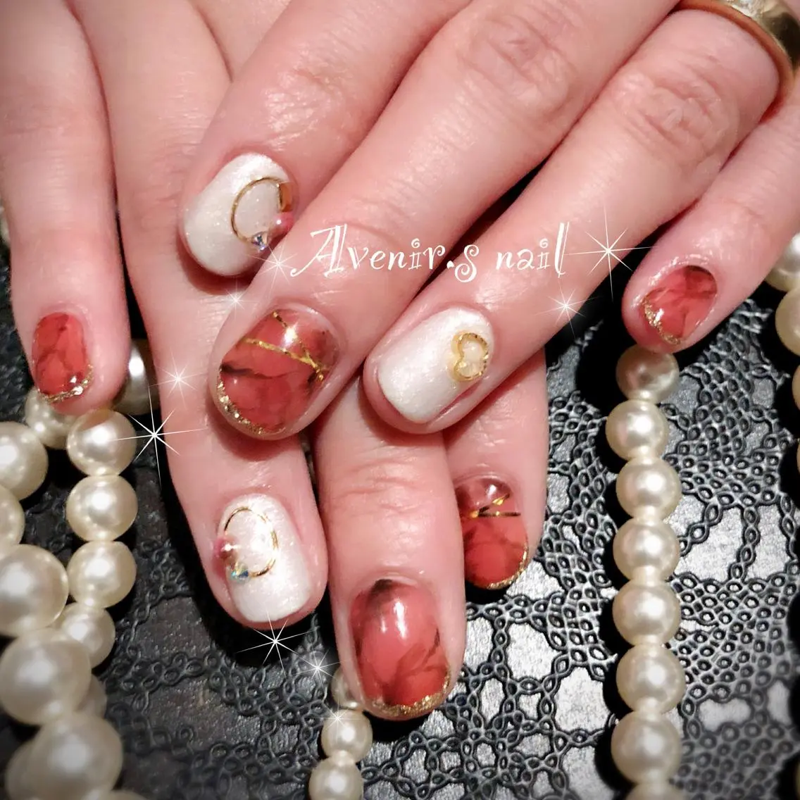 ネイル アートネイル べっ甲ネイル 赤色 Home Salon Avenir.のネイルデザイン