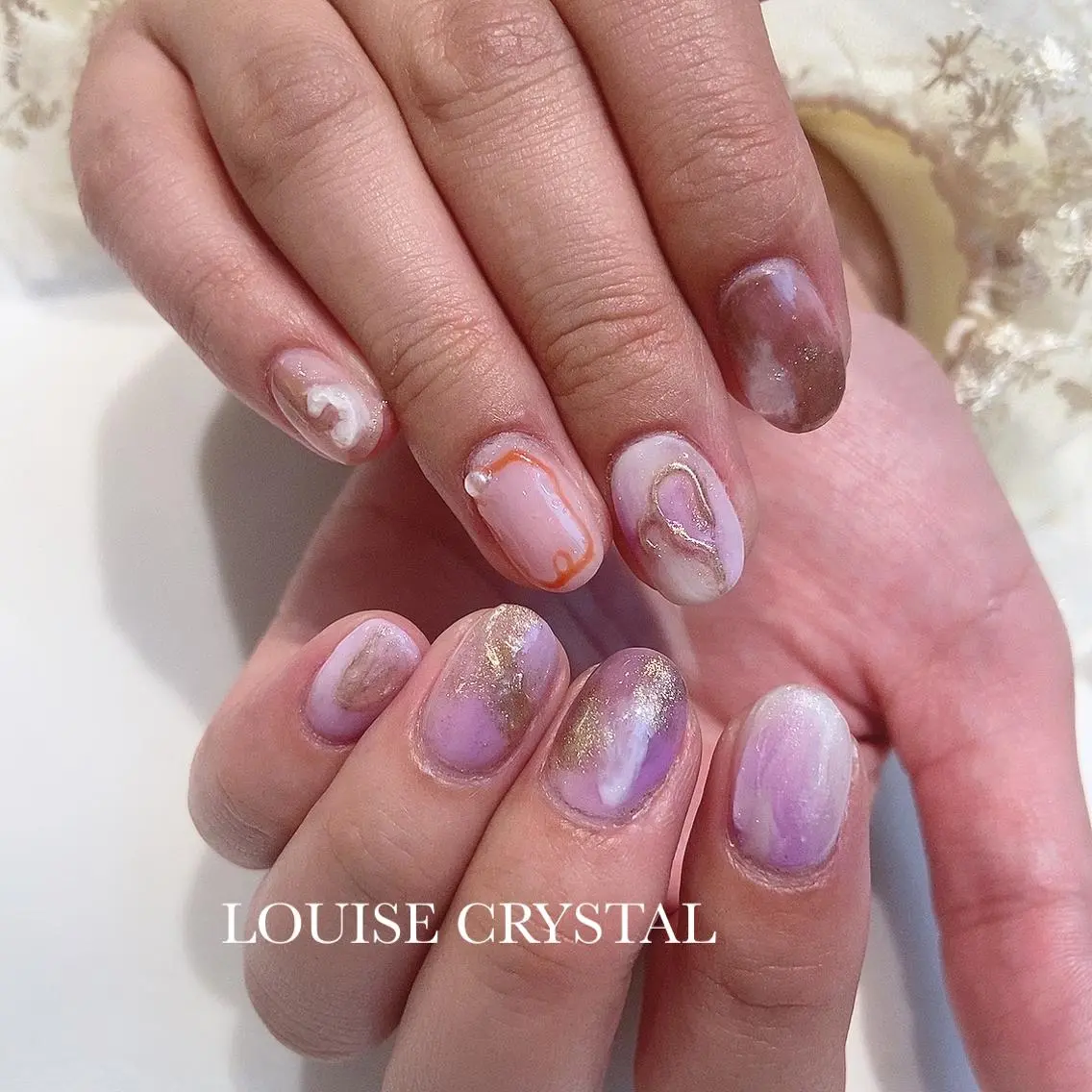 ネイル ハンドネイル LOUISE CRYSTALのネイルデザイン