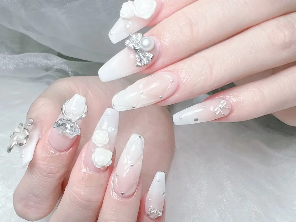 ネイル 成人式 ロングネイル マグネットネイル 大理石ネイル(マーブル) リボン ハンドネイル MoMoA Nail ネイル長さ出し専門店のネイルデザイン