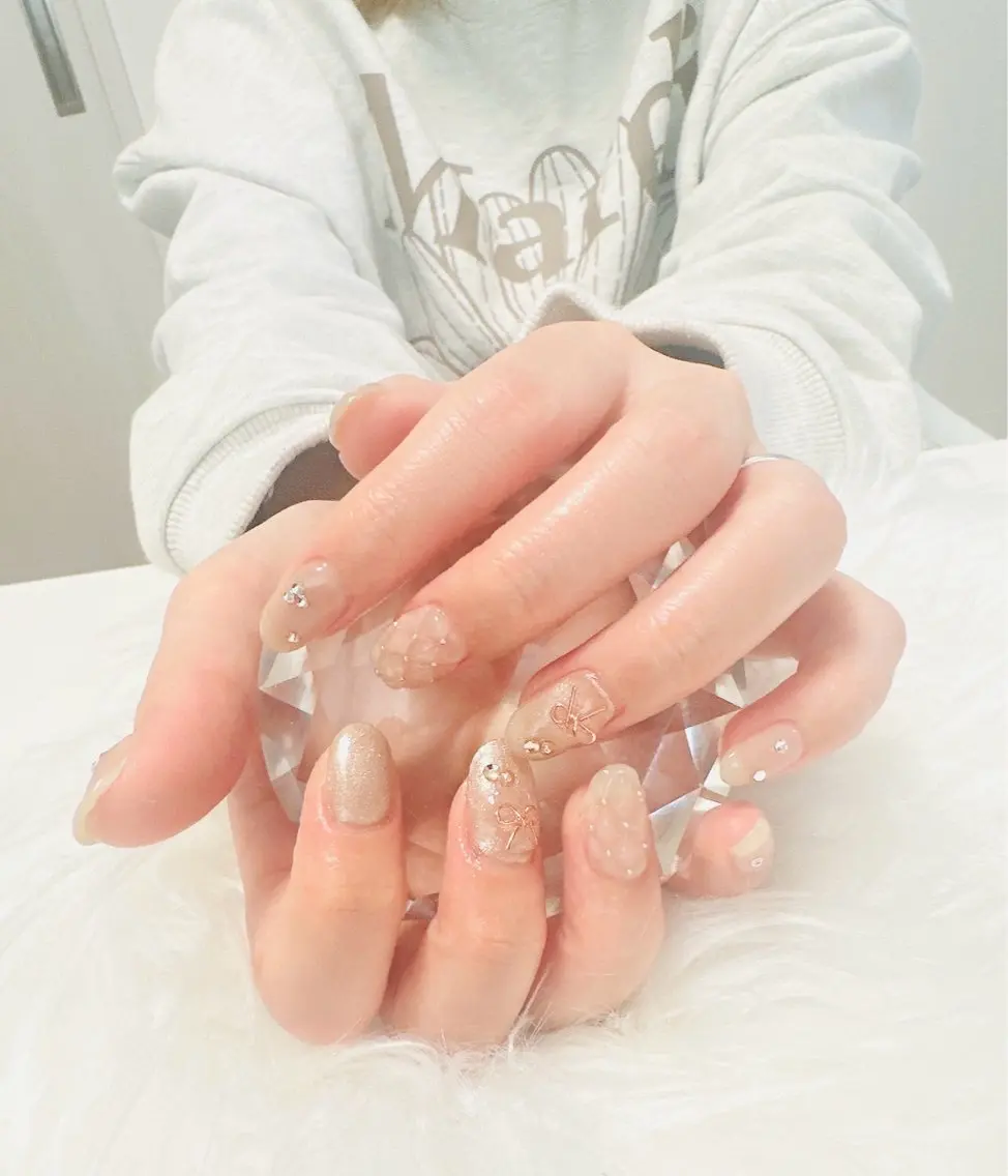 ネイル ゴールド 持ち込み ピンク リボン nailsalon oluoluのネイルデザイン