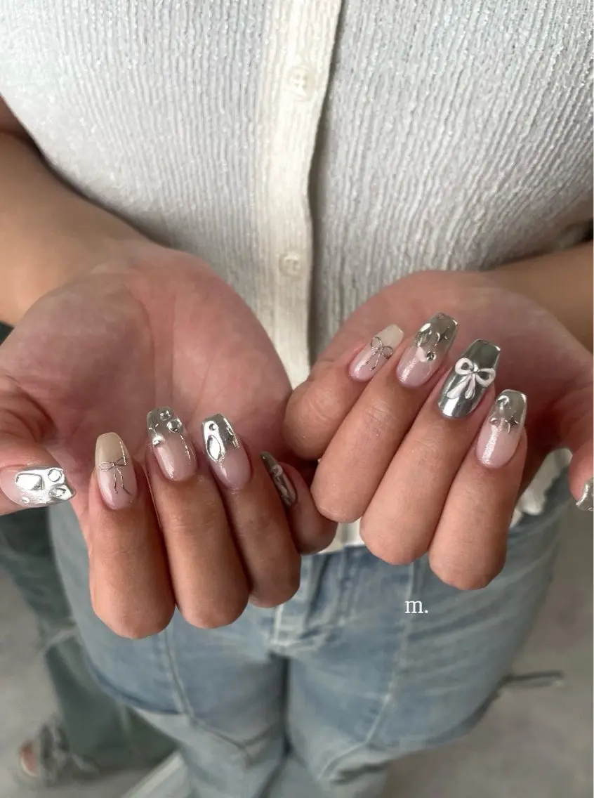 ネイル オーロラネイル マグネットネイル ミラーネイル リボン フットネイル m.nail salonのネイルデザイン