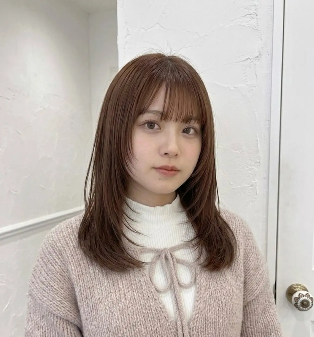 ミディアムレイヤーカット(トリートメント付)【6月28日限定】の写真