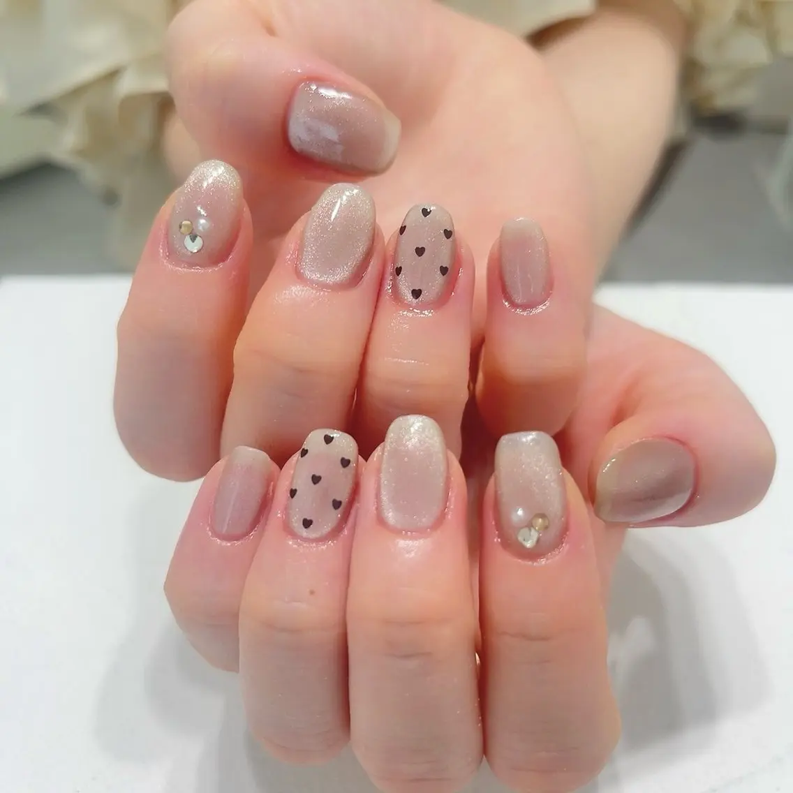 ネイル ブラウン ジェルネイル ハート 氷ネイル・うるうるネイル ミラーネイル kiu nailsalonのネイルデザイン