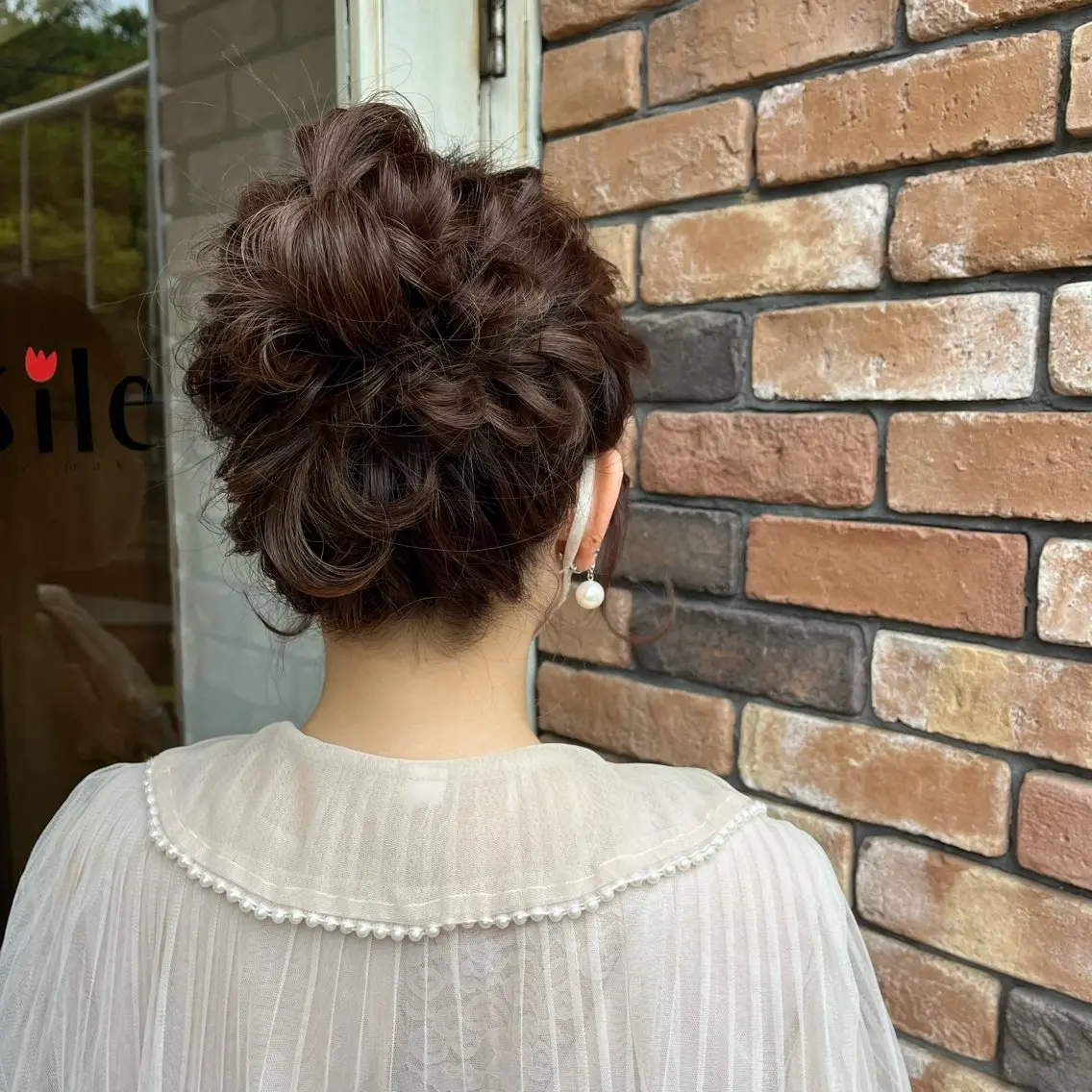 セミロング ヘアアレンジ お団子ヘア 西尾 梢枝のマツエク・マツパデザイン