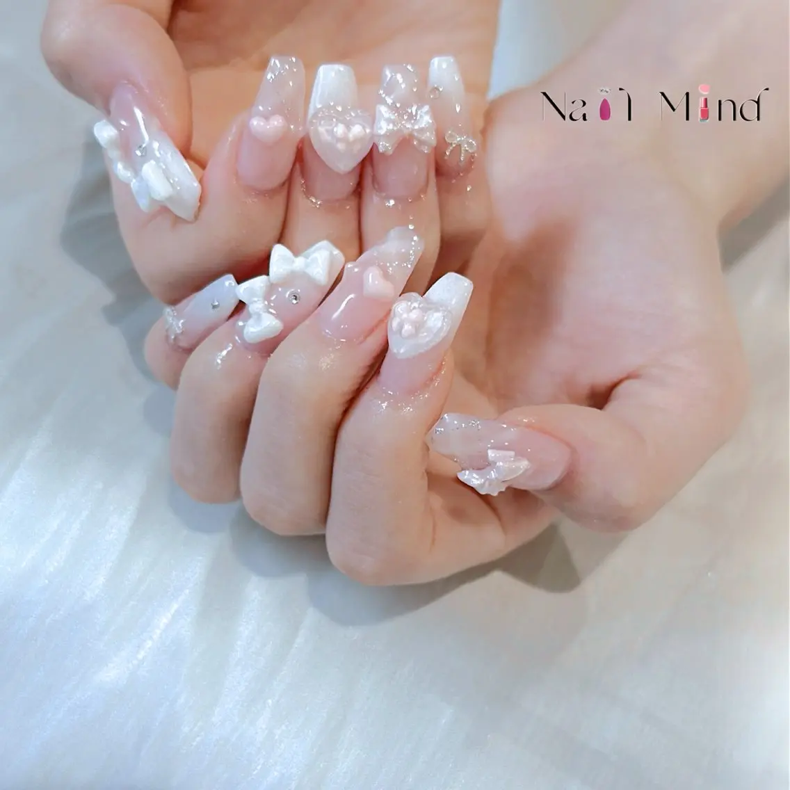 ネイル フレンチネイル ガーリー ハート 氷ネイル・うるうるネイル キラキラネイル ハンドネイル NailMind Tokyoのネイルデザイン