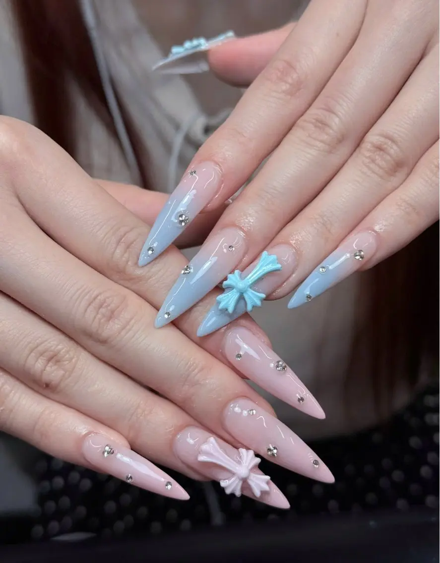 ネイル ブルー ガーリー 韓国ネイル ピンク リボン Iconic Nailのネイルデザイン