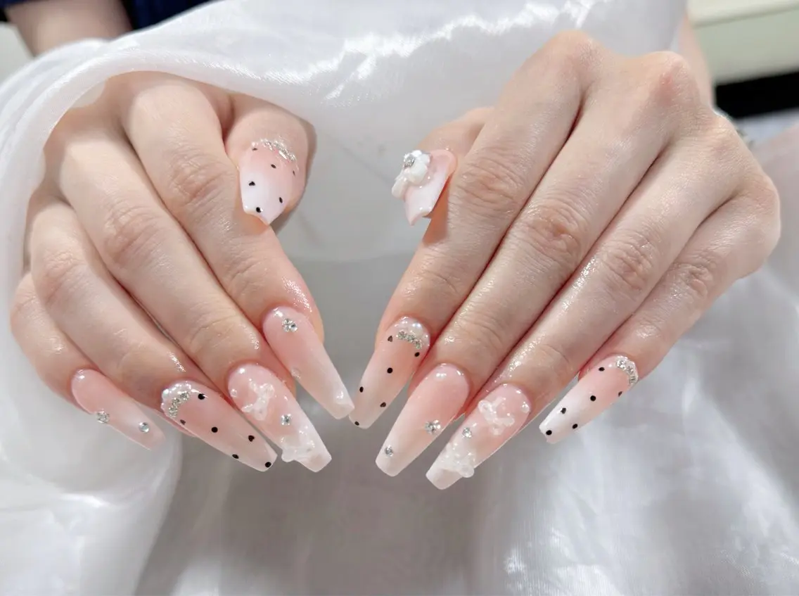 ネイル 成人式 ロングネイル マグネットネイル 大理石ネイル(マーブル) リボン ハンドネイル ZUZU AMEE NAILのネイルデザイン