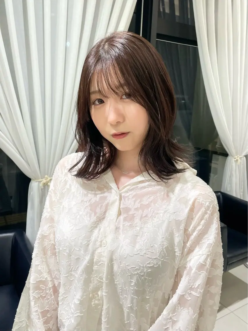 ミディアム 秋山 智香のヘアスタイル