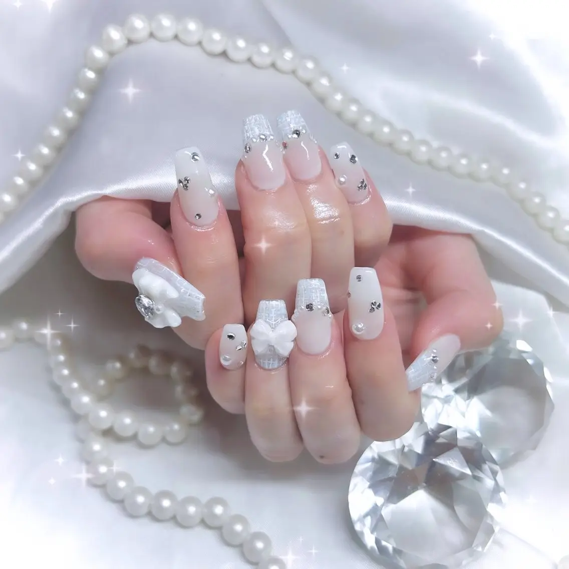 ネイル アートネイル ブルー リボン ツイードネイル 冬ネイル élu by Noriko 前原のネイルデザイン