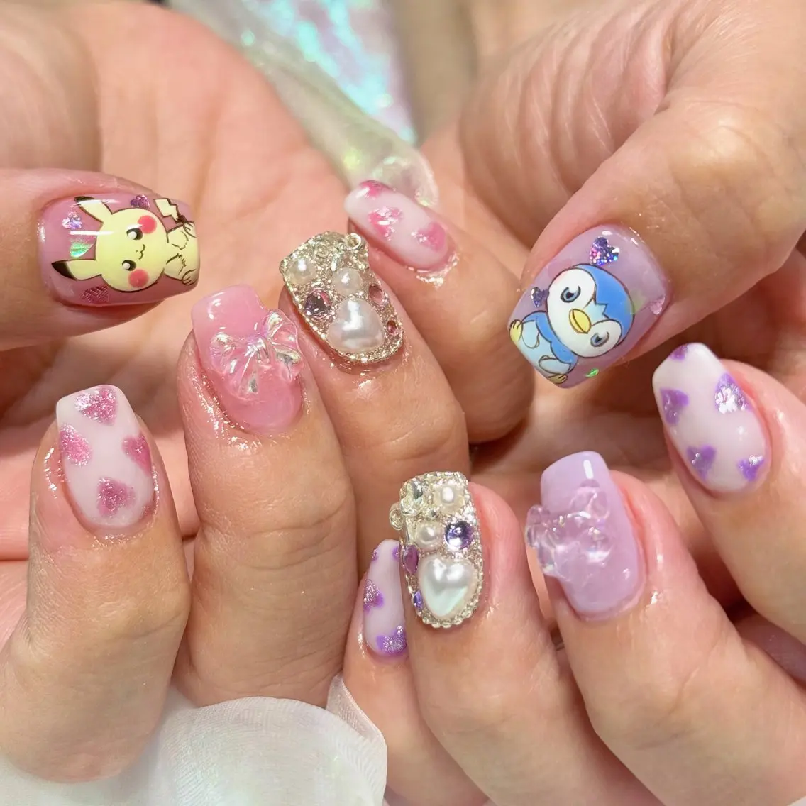 ネイル オーロラネイル キラキラネイル マグネットネイル ピンク パープル ハンドネイル 【OKIKA】 らん🦖🌈🧡のマツエク・マツパデザイン
