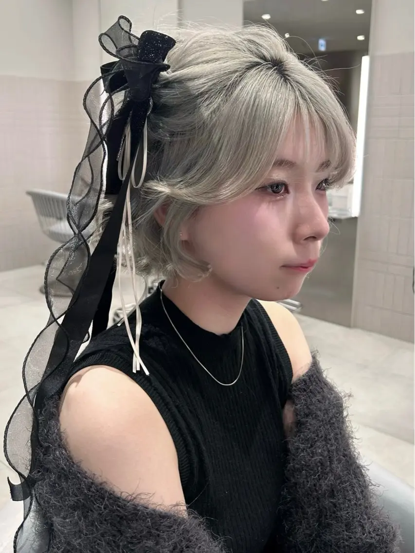 ‪†‬ AISAのヘアスタイル