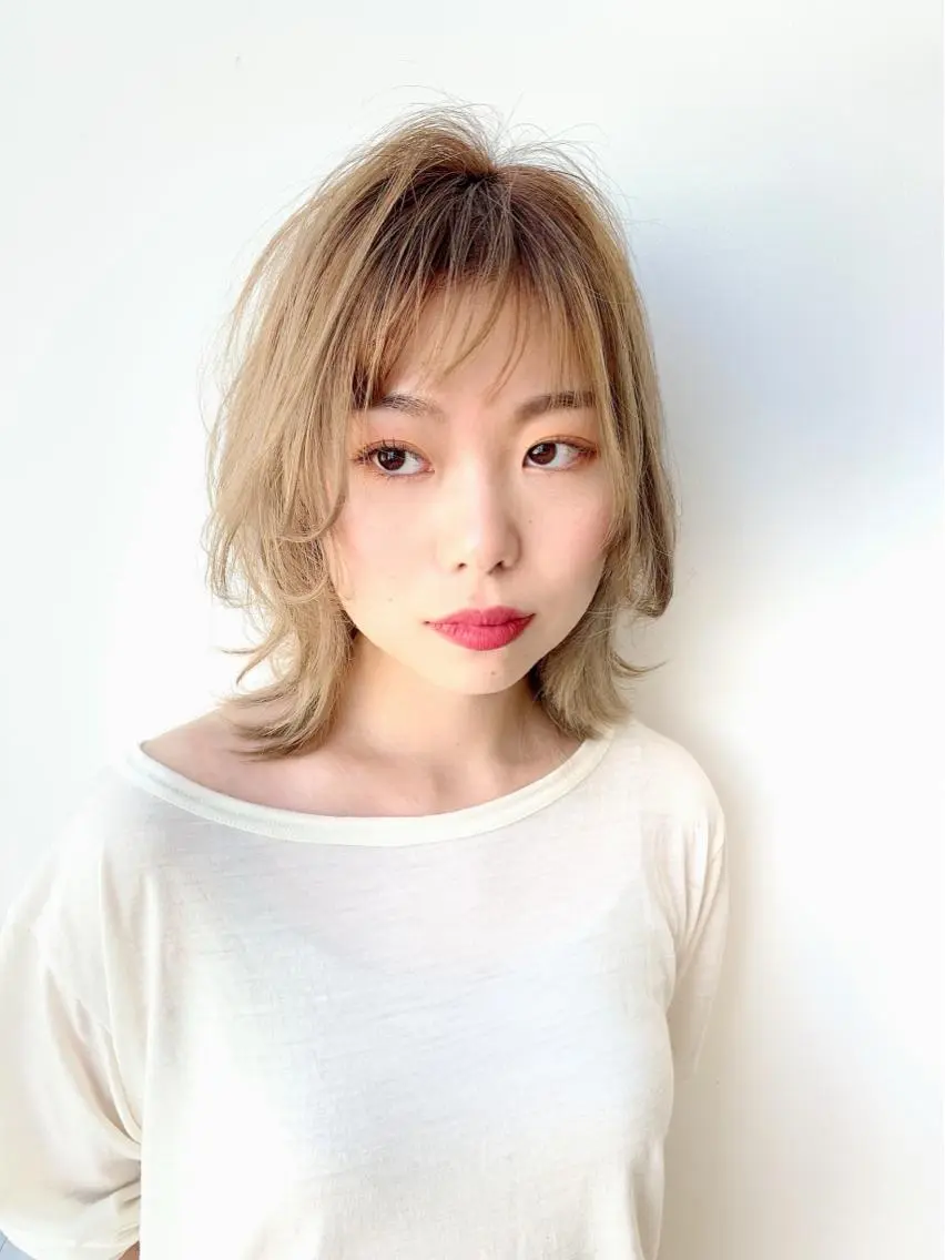 毛先の軽やかさが人気のレイヤースタイルカットの写真