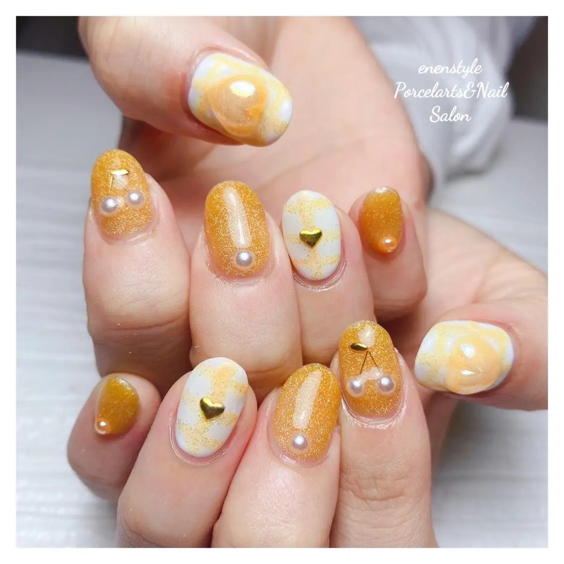 ミディアム ネイル 🐾enen style 🐾のネイルデザイン