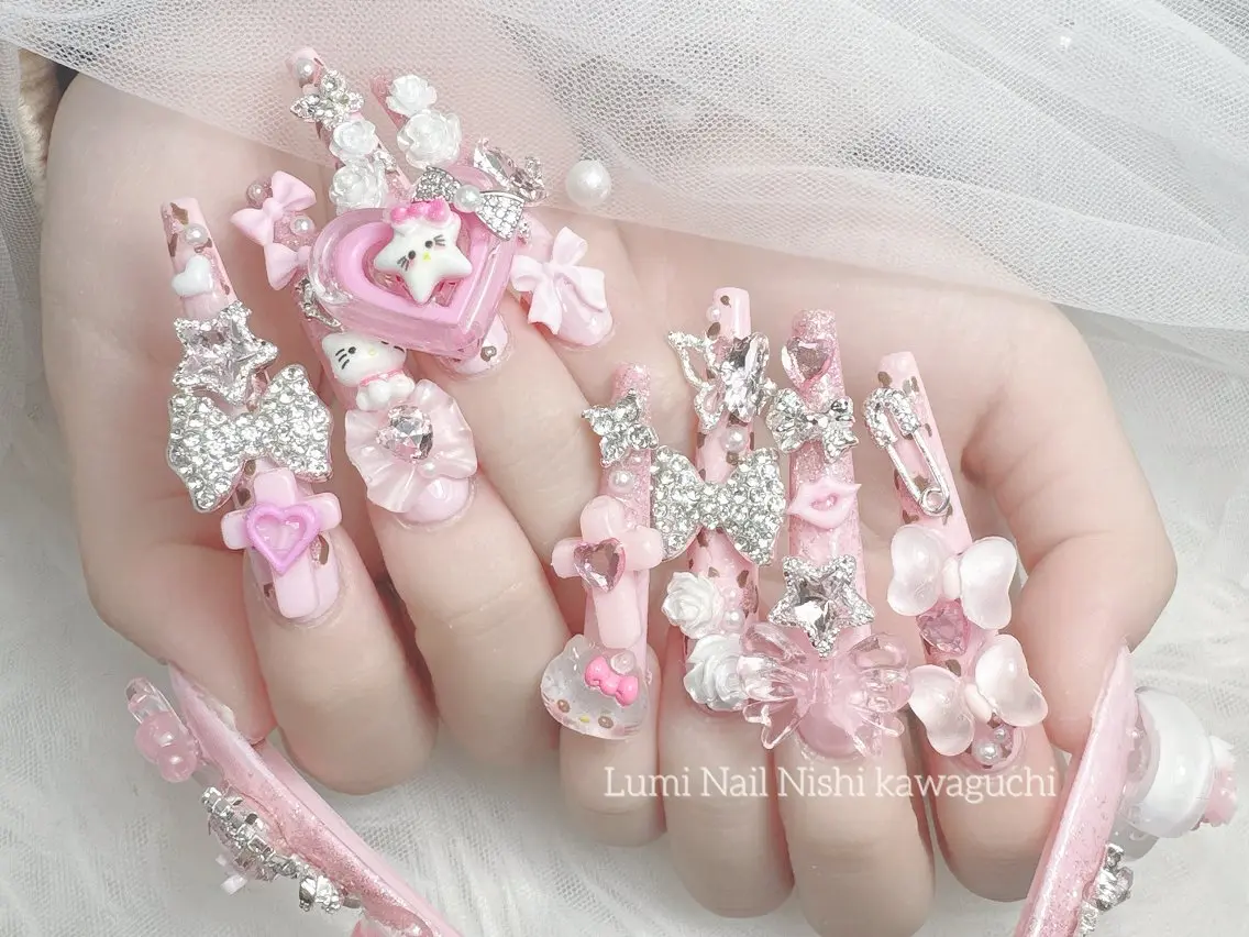 ネイル ジェルネイル ガーリー ハート キラキラネイル ピンク Lumi Nail Salonのネイルデザイン