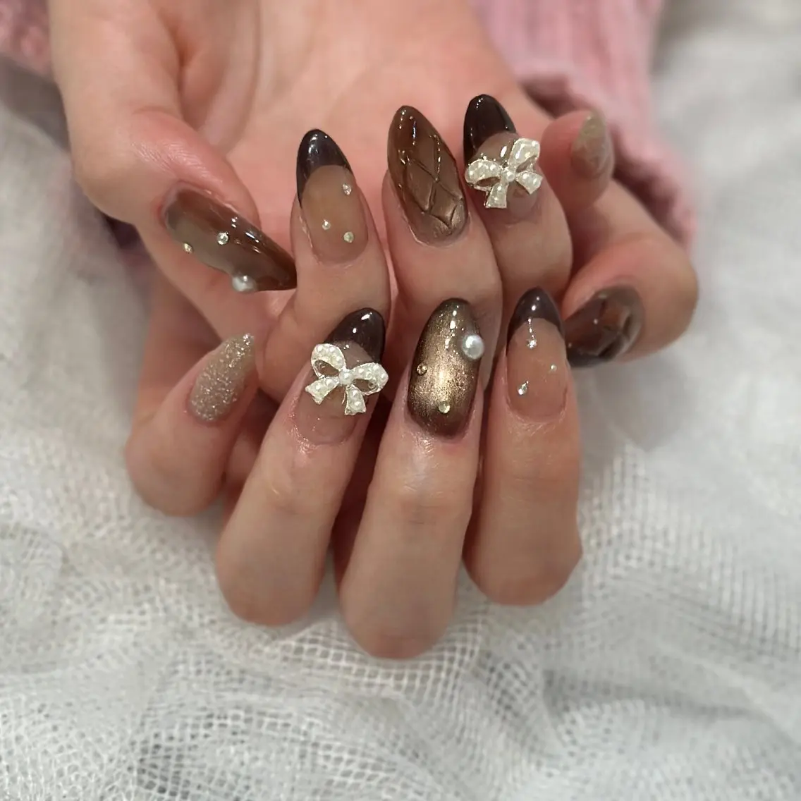 ネイル ブラウン キラキラネイル リボン ハンドネイル private. nailsalonのネイルデザイン