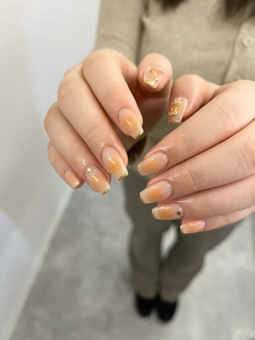 ネイル チークネイル ジェルネイル マグネットネイル ニュアンスネイル オレンジ ハンドネイル ハンドケア Bana_ Nailのネイルデザイン