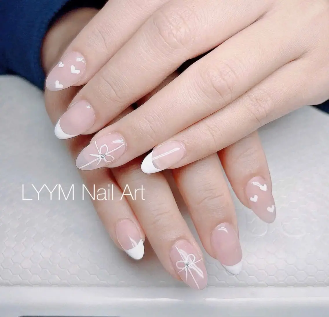 ネイル フレンチネイル ハート オフィスネイル リボン シンプルネイル ハンドネイル LYYM Salonのネイルデザイン