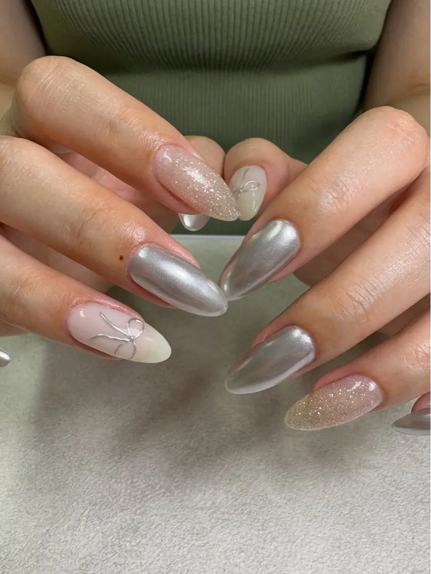 ネイル ミラーネイル リボン ハンドネイル Nail salon Genieのネイルデザイン