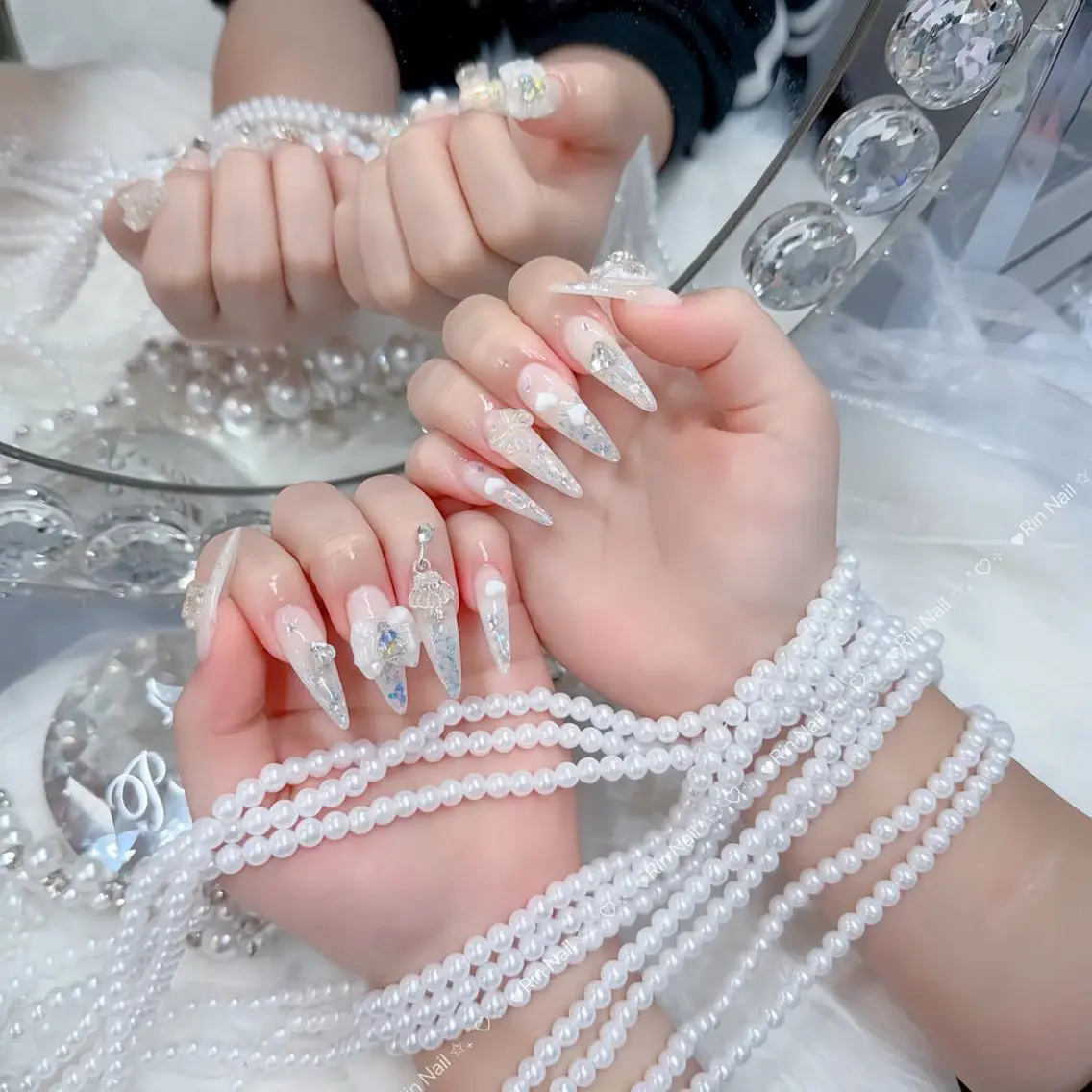 ネイル オーロラネイル チークネイル 桜ネイル クリアネイル ドット ハンドネイル Rin Nail Shinokuboのネイルデザイン