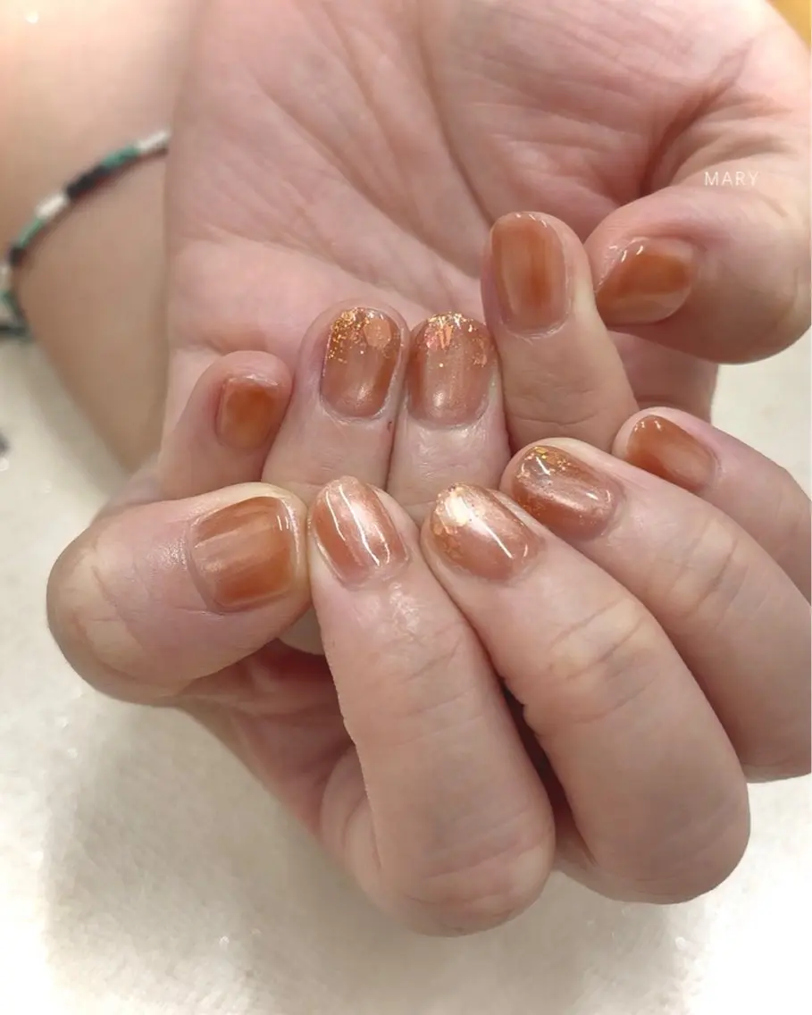 ネイル キラキラネイル マグネットネイル ワンカラーネイル オレンジ ハンドネイル Mary nail .narumiのネイルデザイン