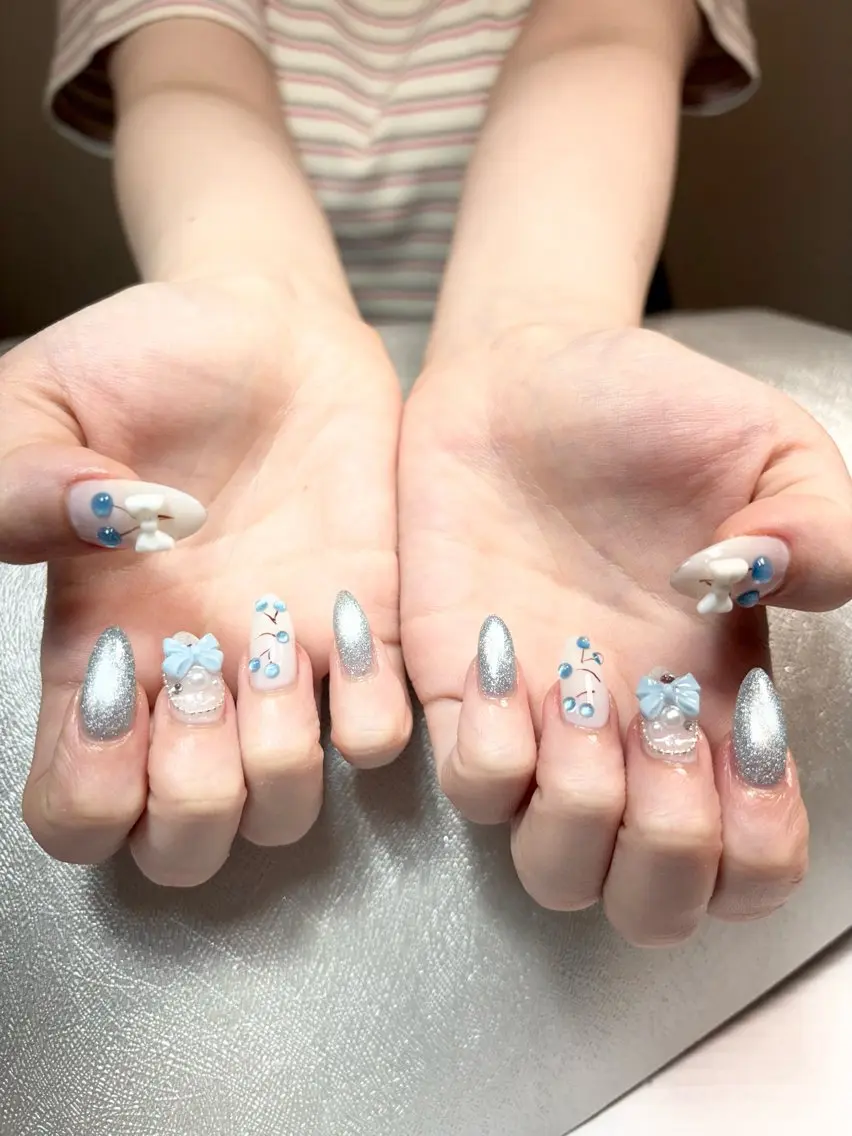 ネイル ブルー フラッシュネイル フラッシュマグ マグネットネイル リボン ハンドネイル ✨韓国✨nail salonLumieのネイルデザイン