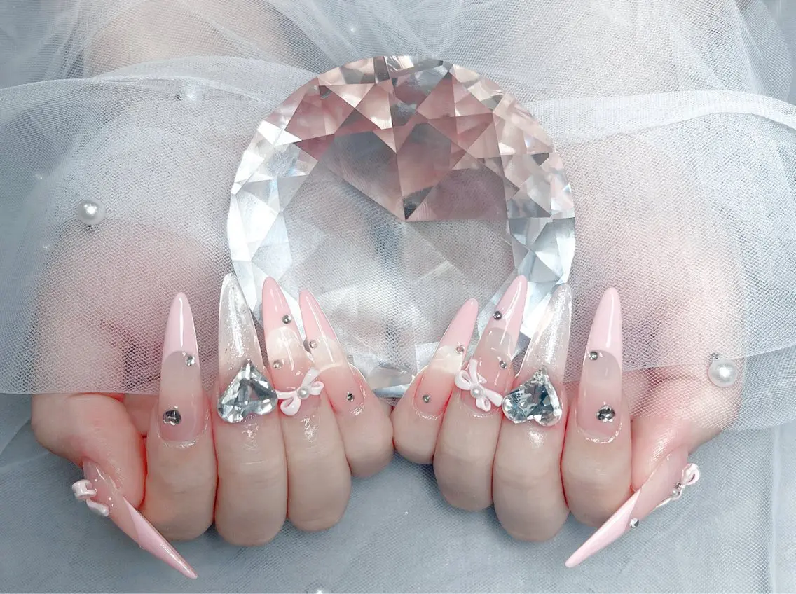 ネイル 成人式 ロングネイル マグネットネイル 大理石ネイル(マーブル) リボン ハンドネイル Amee Nail Salonのネイルデザイン