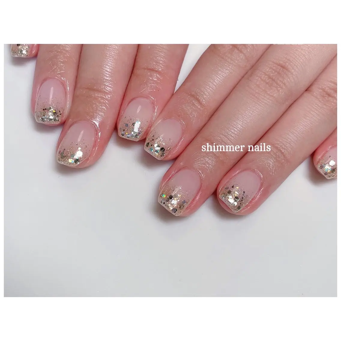 ネイル クリアネイル ゴールド ラメ(グリッター) ホワイト shimmer nailsのネイルデザイン