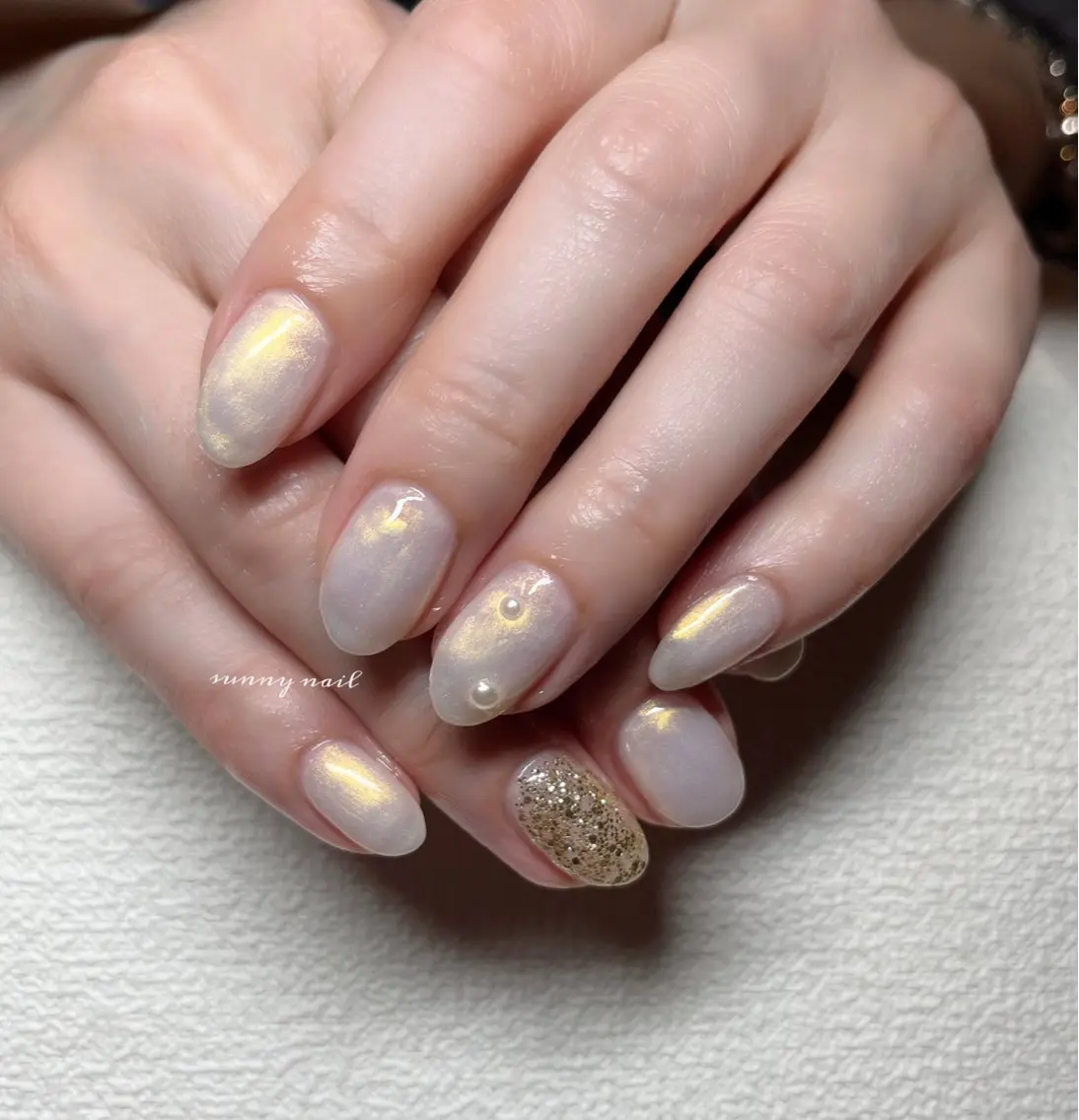 ネイル オーロラネイル ジェルネイル ゴールド パラジェル 冬ネイル sunny nailのネイルデザイン