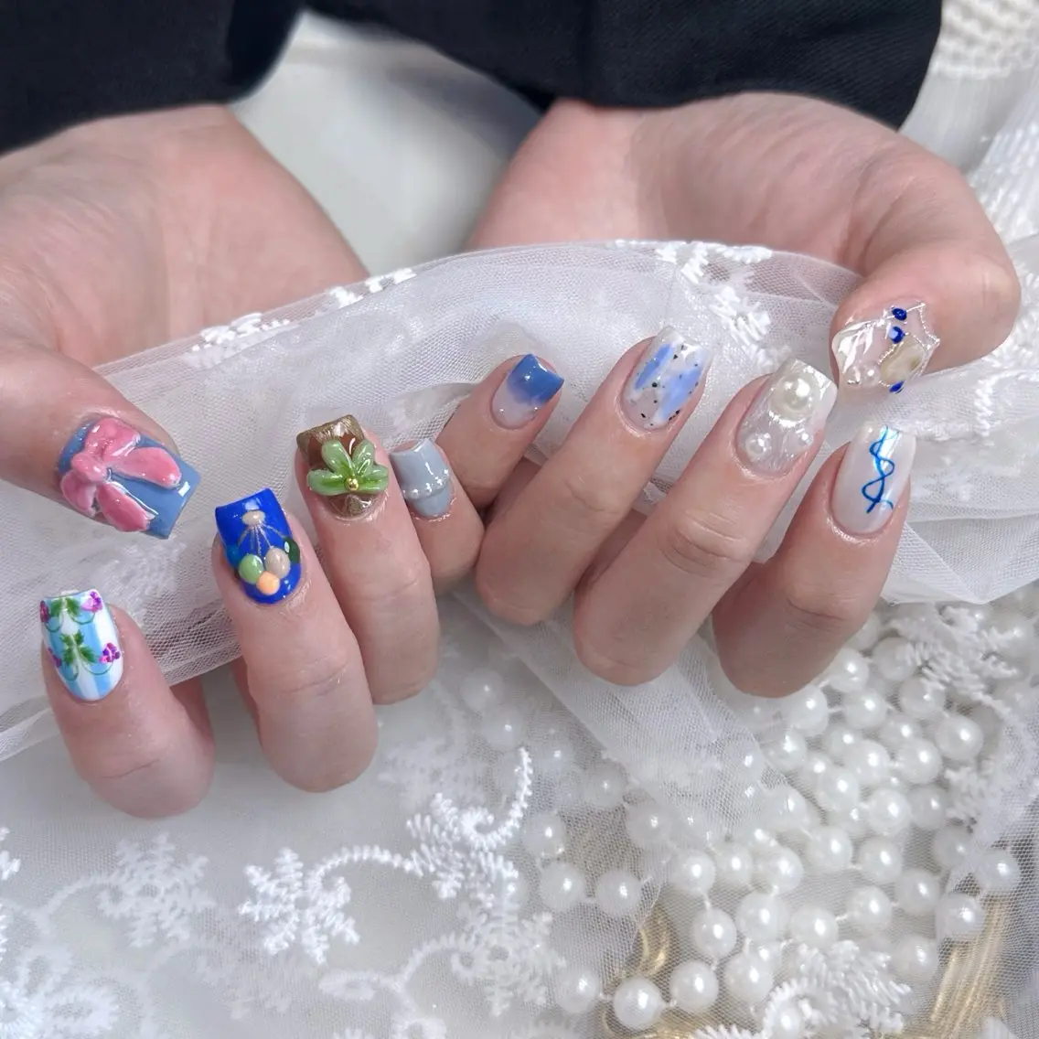 ネイル アートネイル 韓国ネイル 水色 ロングネイル マグネットネイル ハンドネイル ハンドケア NailDemure 【銀座店】のネイルデザイン