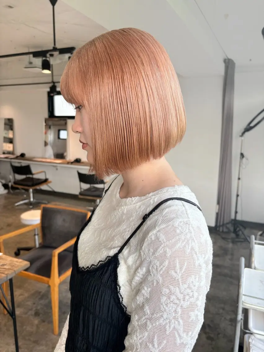 ミディアム カラー ベージュカラー ブリーチ ダブルカラー ミルクティーベージュ オレンジ 暖色カラー🍒 ケアブリーチ/akiのヘアスタイル